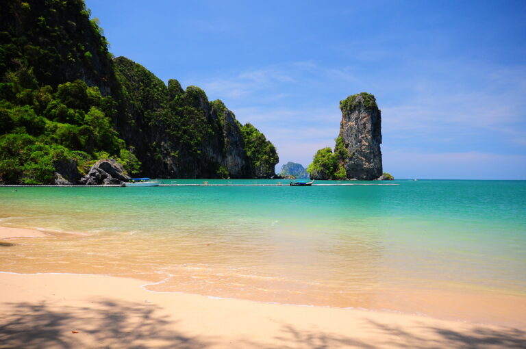 Scenic view of Ao Phra Nang Beach in Krabi, one of the Jurassic World Rebirth Thailand filming locations, with turquoise waters and limestone cliffs