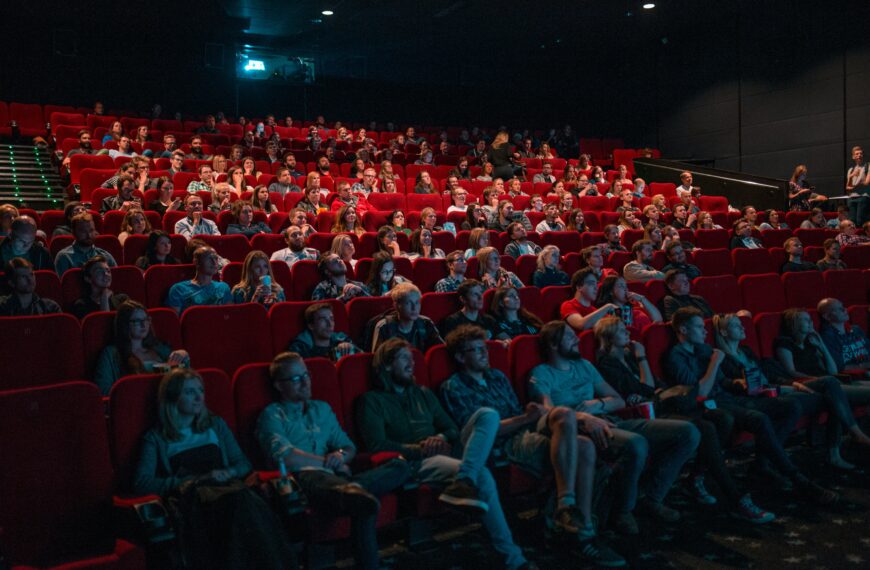 Audience seated in a cinema auditorium before a screening